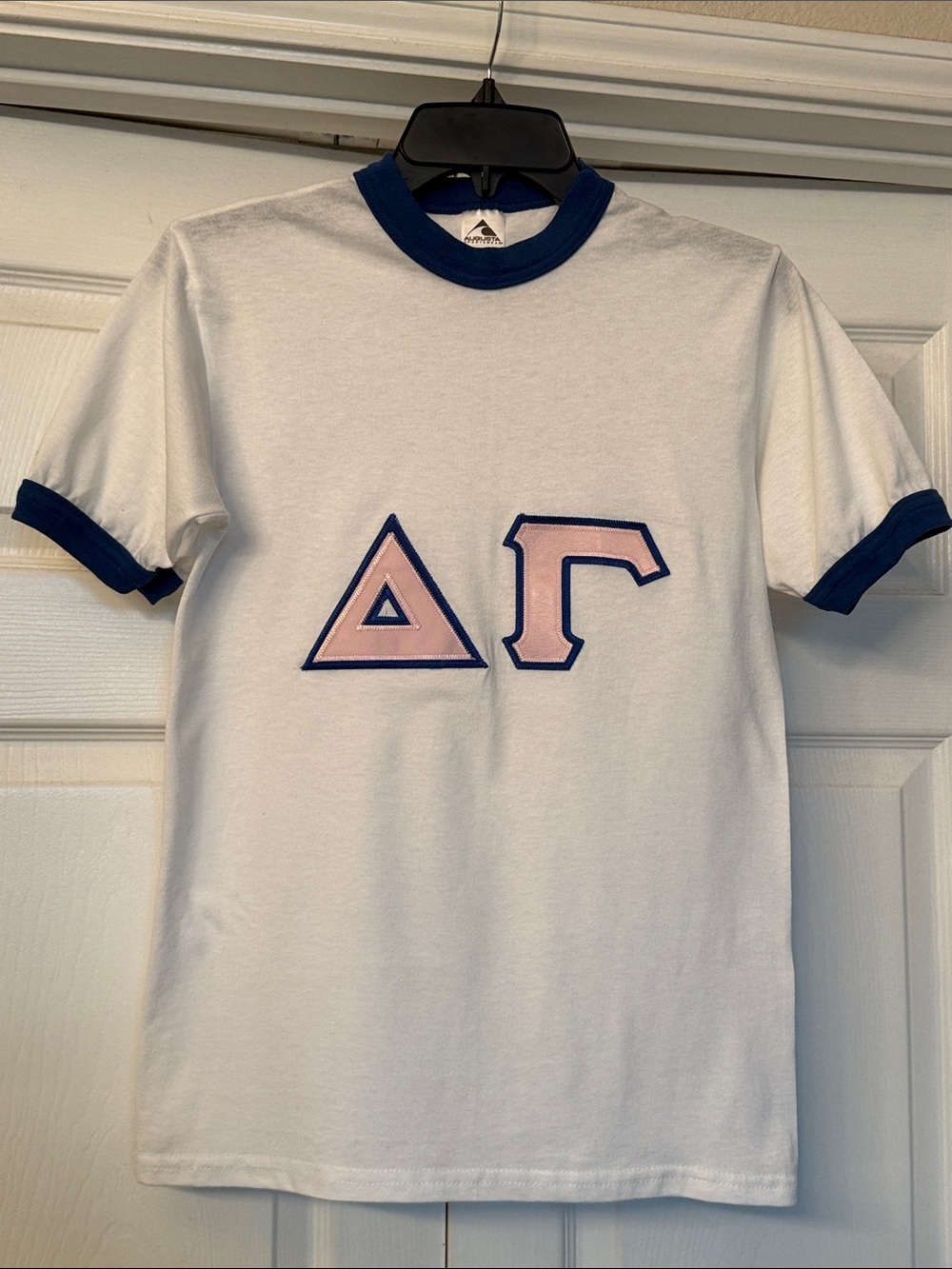 Augusta Sportswear White Ringer Tee with Navy Trim and Pink Greek Letters
